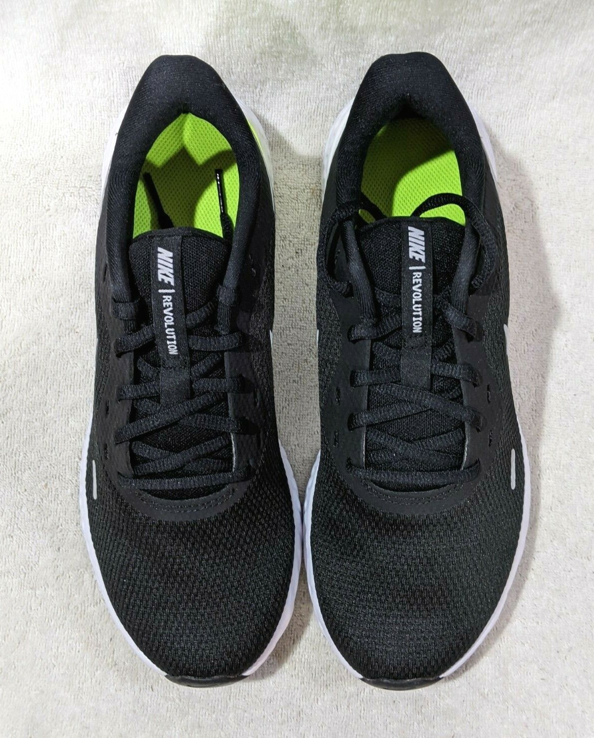 nike revolution 5 black volt