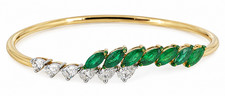 14kt gold diamond and emerald bracelet