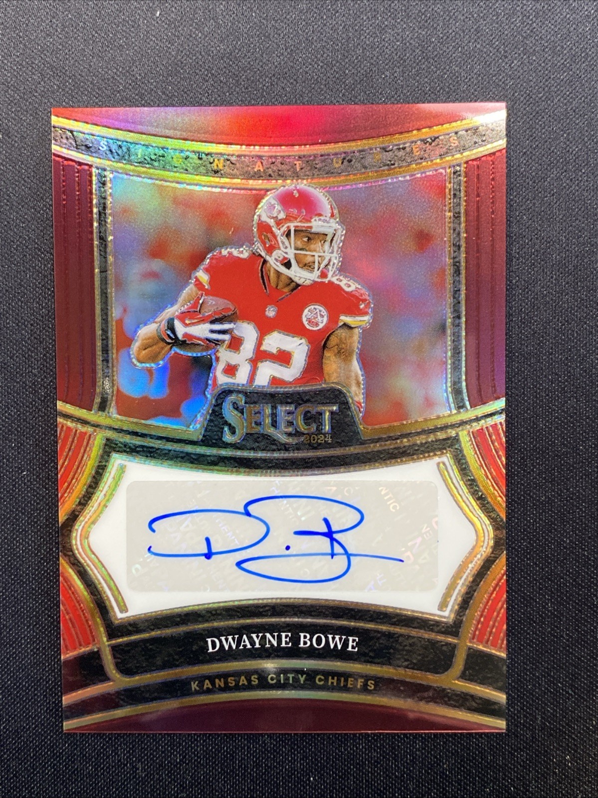 2024 Panini Select - Signatures Dwayne Bowe #SP-DBE Maroon Prizm /75 (AU)
