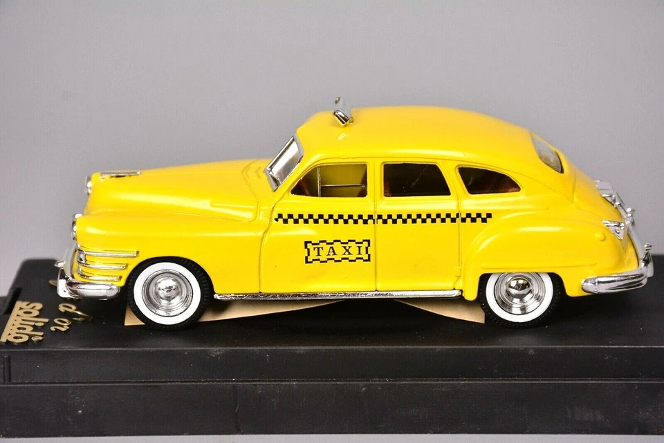 Taxi cabina Solido Chrysler Windsor, amarillo, carcasa Foto 2 de 4