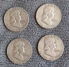 Lot of 4 circulated 1953d Franklin Half Dollars