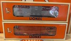 (2) Lionel 6464 Boxcars "Silver Meteor" and "Super Chief" NIB #19290 and #19282 — photo 1