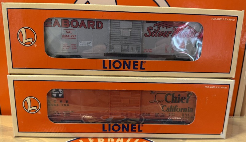 (2) Lionel 6464 Boxcars "Silver Meteor" and "Super Chief" NIB #19290 and #19282