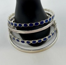 Set Of 4 silver Tone and blue enamel bangle bracelets