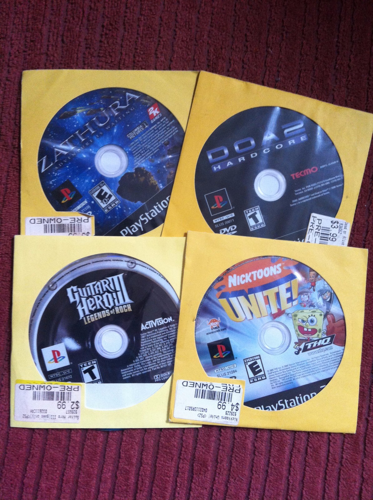 4 Playstation 2 games DOA 2 Hardcore, Zathura, Guitar Hero III + 1 other PS2