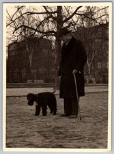 Vtg B&W Snapshot Elderly Man In Overcoat & Hat With Black Poodle In Park 1950s