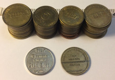 LOT OF (48) - TIL T FAMILY AMUSEMENT CENTER TOKENS * ELECTRONIC AMERICA NAUTILUS