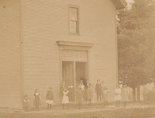 Vintage Postcard Real Photo Children out side of the school house c 1907-1923