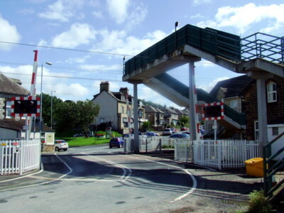 PHOTO  HEST BANK LEVEL CROSSING THE WEST COAST MAIN LINE IS A 400-MILE RAILWAY L
