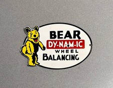 VINTAGE 13” BEAR DYNAMIC BALANCING PORCELAIN SIGN CAR GAS TRUCK MOTORCYCLE