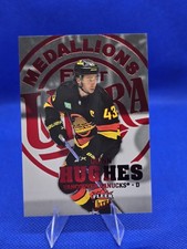 2023-24 Upper Deck Fleer Ultra Medallions #M-30 Quinn Hughes Ruby Red /50