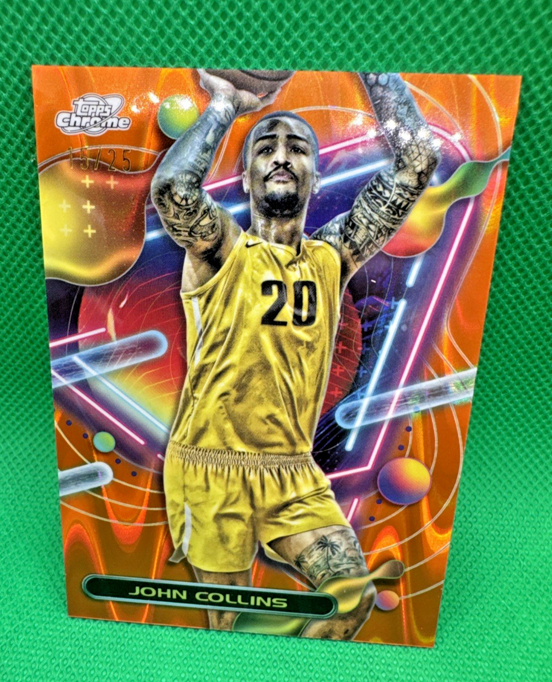 John Collins Topps Cosmic Chrome 23-24 Orange Galactic /25 #130 Jazz