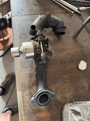 the air intake manifold, Carburetor And intake elbow. Used
