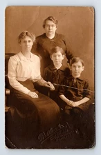 AZO RPPC Postcard Real Photo Portrait of Family Two Unkown Women and Two Boys