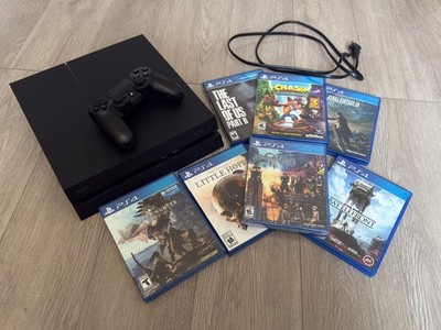 Sony PlayStation 4 Slim 500GB Console + Controller + 7 Games