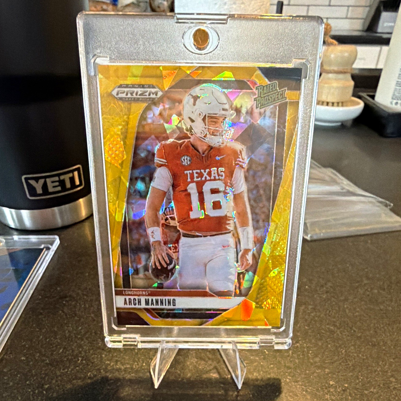 2025 Panini Prizm Draft Picks Arch Manning Texas #166 Gold Ice Prizm Rated
