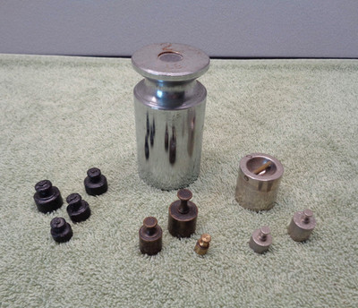 Mixed Lot of 11 Calibration Weights- Up to 2 Pounds- Different Styles & Material