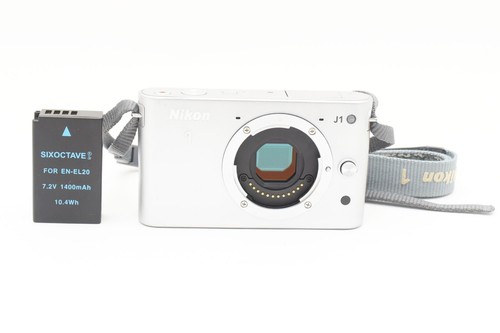 Nikon 1 J1 Mirrorless Camera Body, silver {10.1MP} with Battery 2378372 - 第 1/12 張圖片