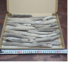 Driftwood from Japan Surf-Tumbled A wooden stick carved by the waves