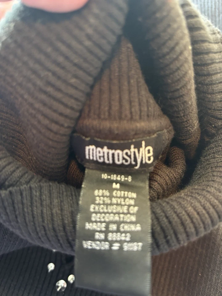 Cuello alto manga larga lentejuelas con diseño recortado Foto 4 de 4