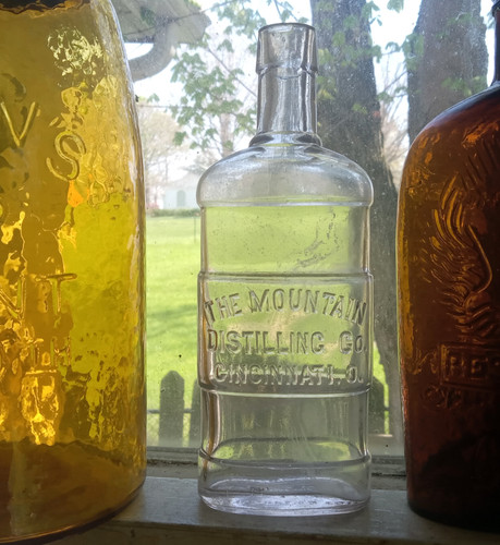 THE MOUNTAIN DISTILLING CO CINCINNATI SCARCE 1890s UNIQUE OVAL WHISKEY FLASK