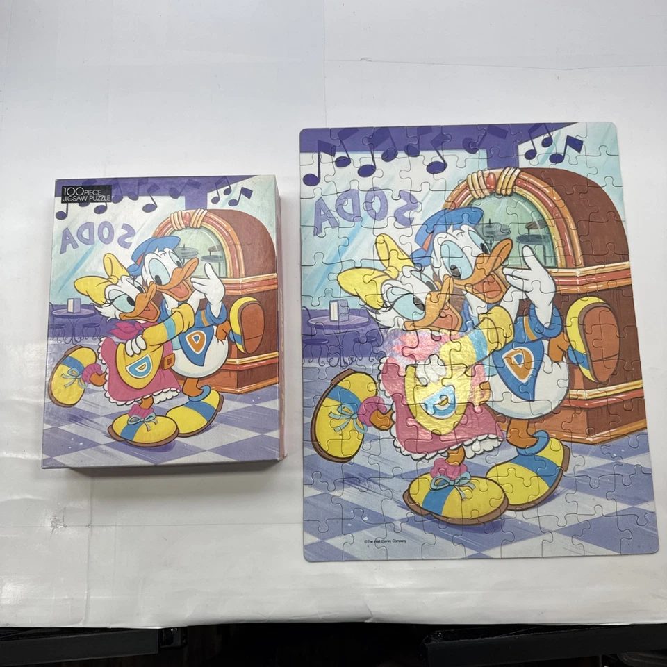 Rompecabezas DORADO 100 piezas para niños Disney Donald Daisy Duck Dancing Soda Shop Foto 2 de 4