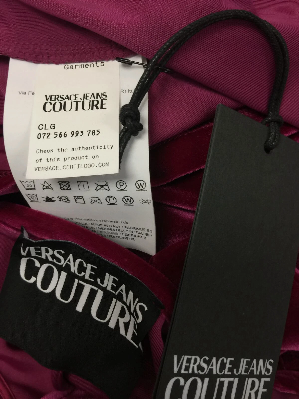 Mini abito da donna rosa Versace a spalle aperte da $475 taglia 46