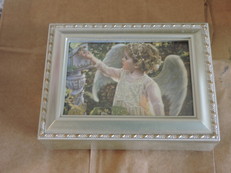 kirlins jewelry music box works plays you light up my life
