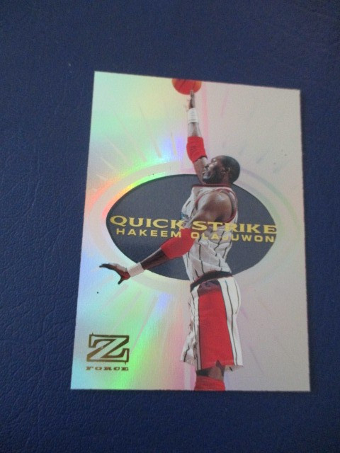 1997-98 Skybox Z-Force Quick Strike Hakeem Olajuwon #7 Rockets