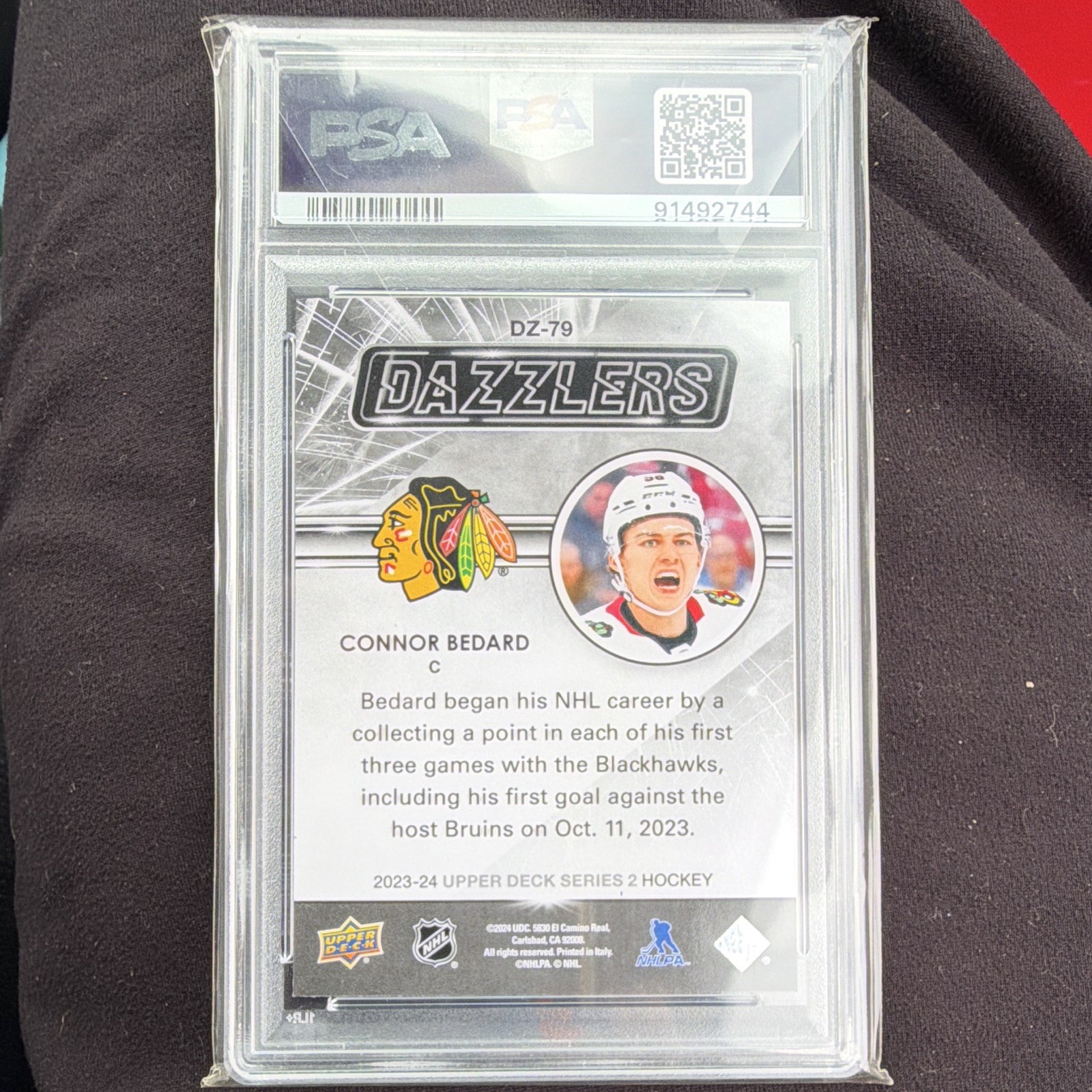 Upper Deck 2023-24 Series 2 Dazzlers Blue RC Connor Bedard DZ-79 PSA 9 view 2