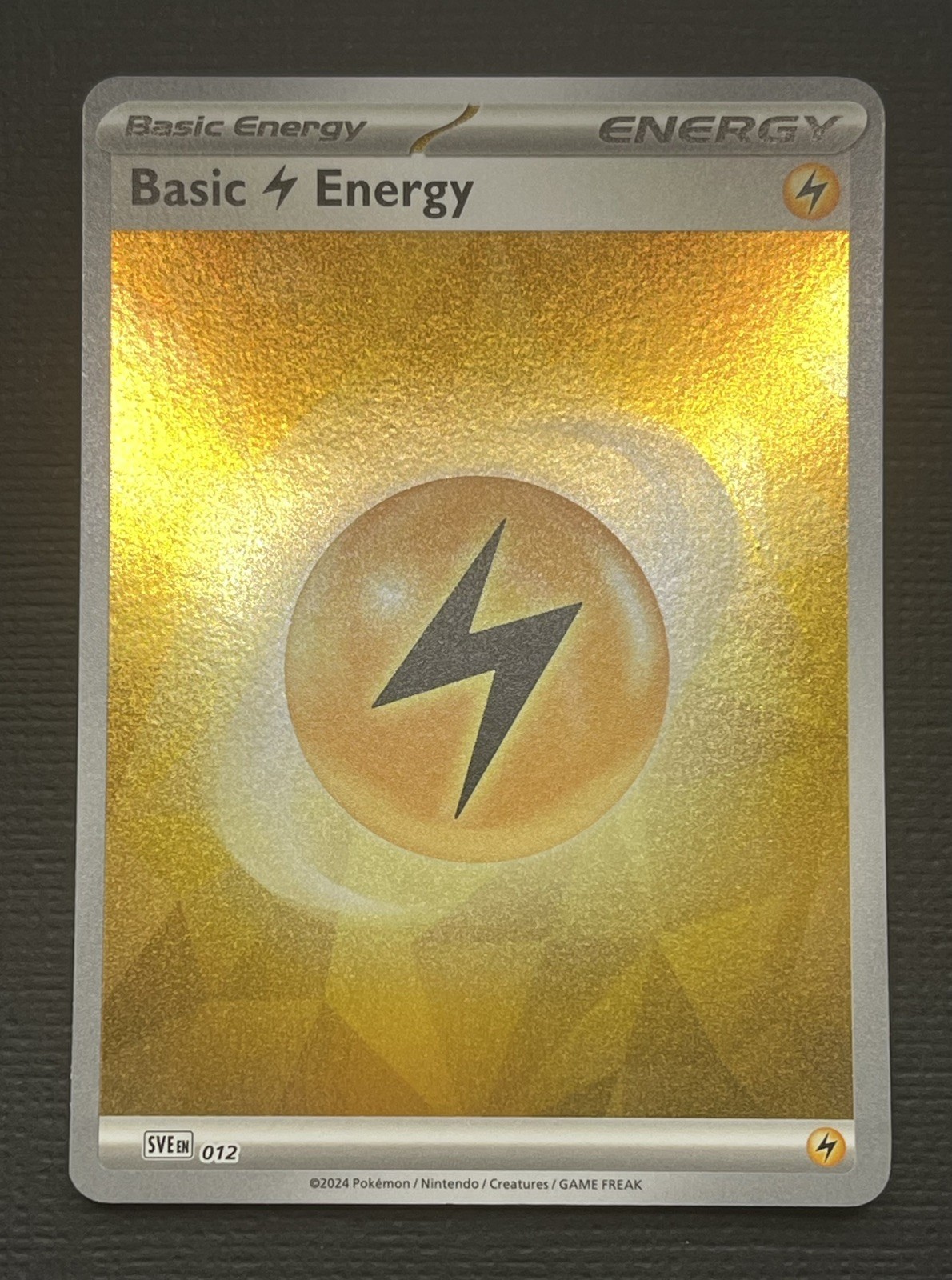 Basic Lightning Energy SVE 012 Holo Prismatic Evolutions Pokemon Near Mint NM