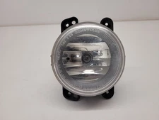 Used Driving Light fits: 2013 Jeep Wrangler Fog-Driving bumper mounted round Gra