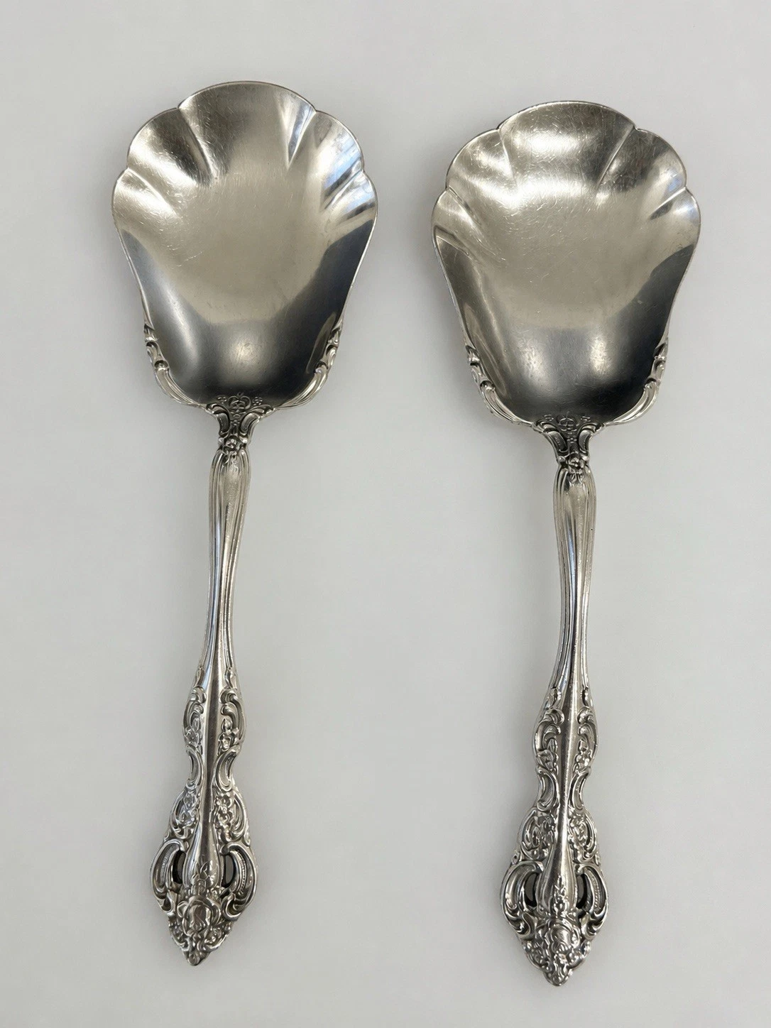Vintage Oneida Stainless Shell Serving Spoons Pair Ornate Floral Design 8.5”