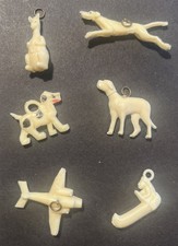 VTG Lot 1940s Celluloid Charms Cracker Jack Toy Prize Dogs Plane Indian Kangaroo