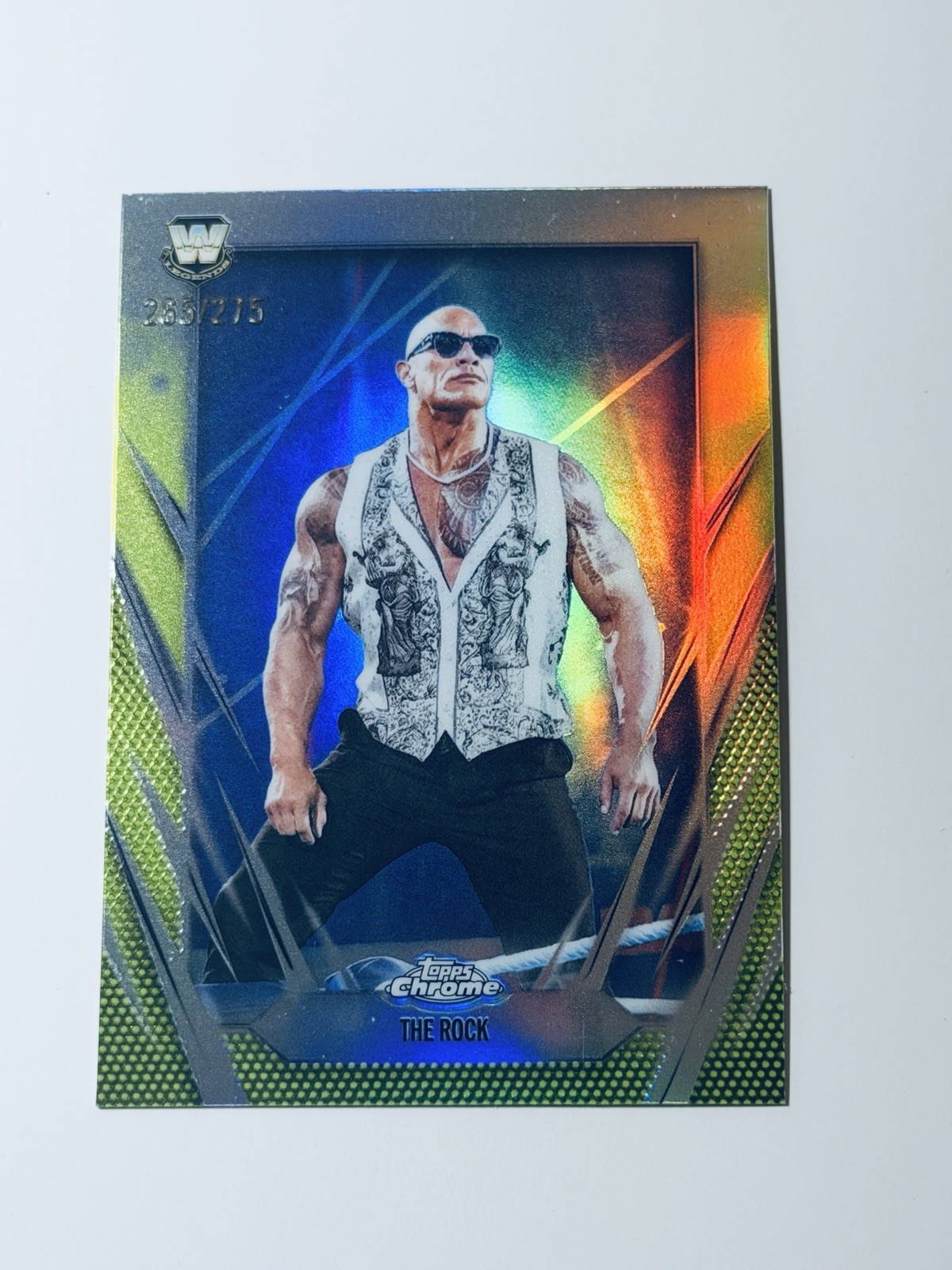The Rock 2026 Topps Chrome WWE #1 Yellow Refractor #/275