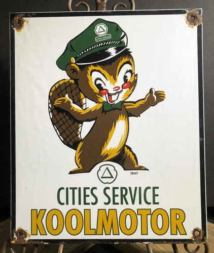 VINTAGE 1947 DATED CITIES SERVICE KOOLMOTOR 12” PORCELAIN GAS SQUIRREL SIGN