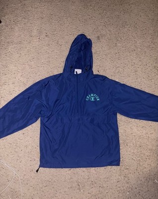 Champion Blue Windbreaker with Champion Graphic on Back. Never worn. Size Medium