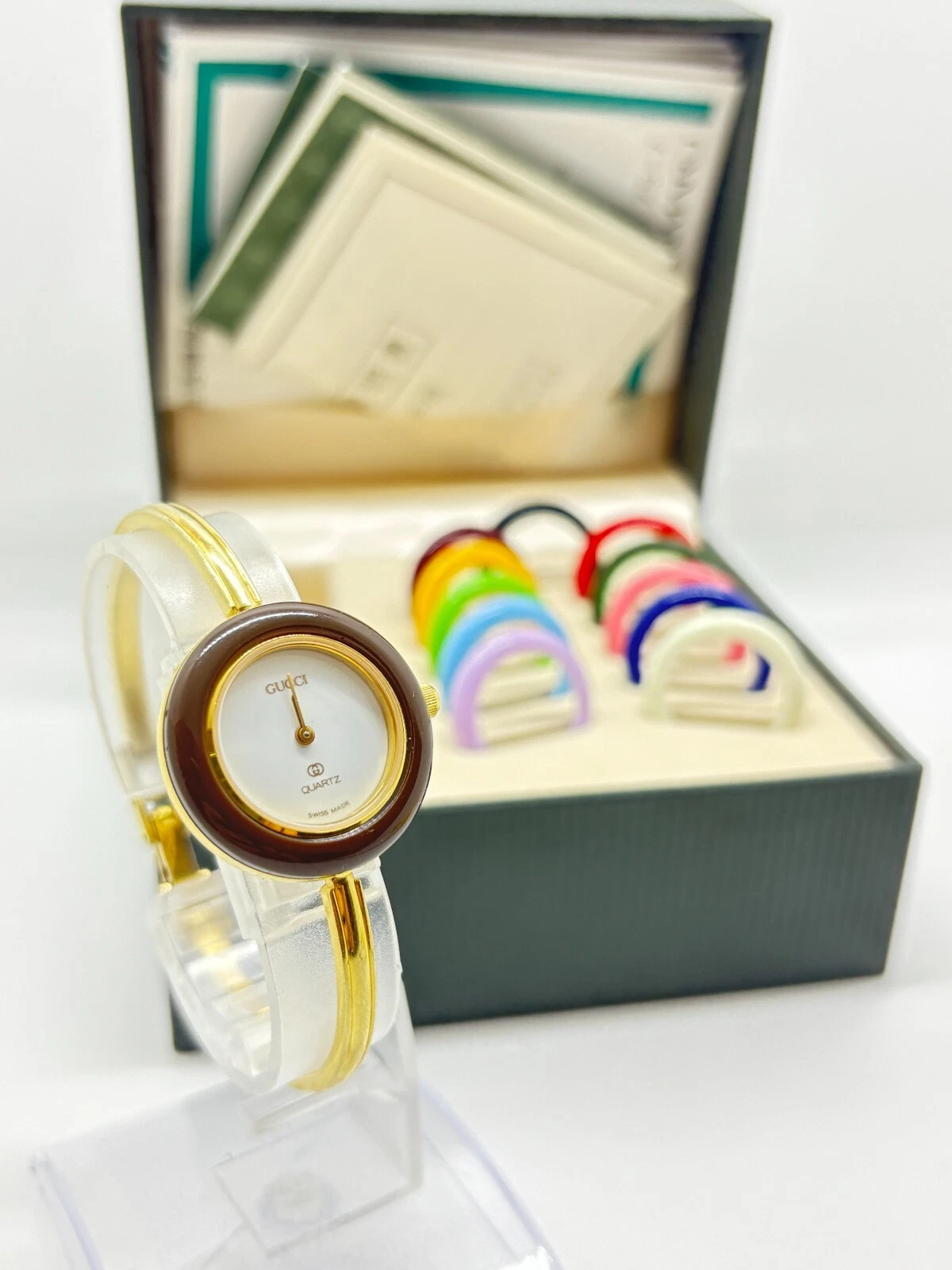 [Presque comme neuve avec boite] Montre GUCCI lunette à changement 1100 L 12 couleurs or occasion fonctionne