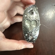 Silver Metal Oval Analog Wristwatch Heart Dial Bangle Closure for Women