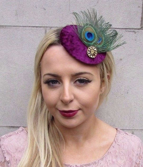plum coloured hats and fascinators