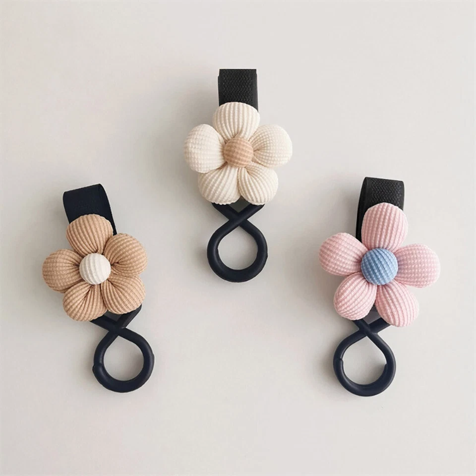 Ganchos para Cochecito de Bebé Flor Giratorio Bolsa Colgador Infantil Organizador Soporte Universal Foto 4 de 4