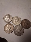 lot of 5 Franklin half dollars 90 percent silver