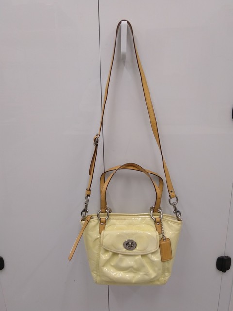 small yellow coach purse