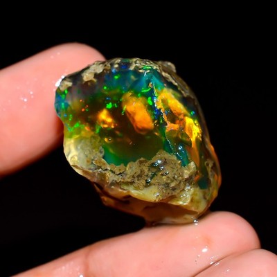 Natural Ethiopian opal oil rough 44.5 Ct multi fire oil raw gemstone 26x19x16 mm