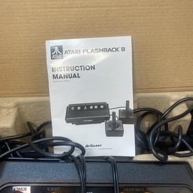 Atari Flashback 8 Black Console and two controllers, no power cord as is Box