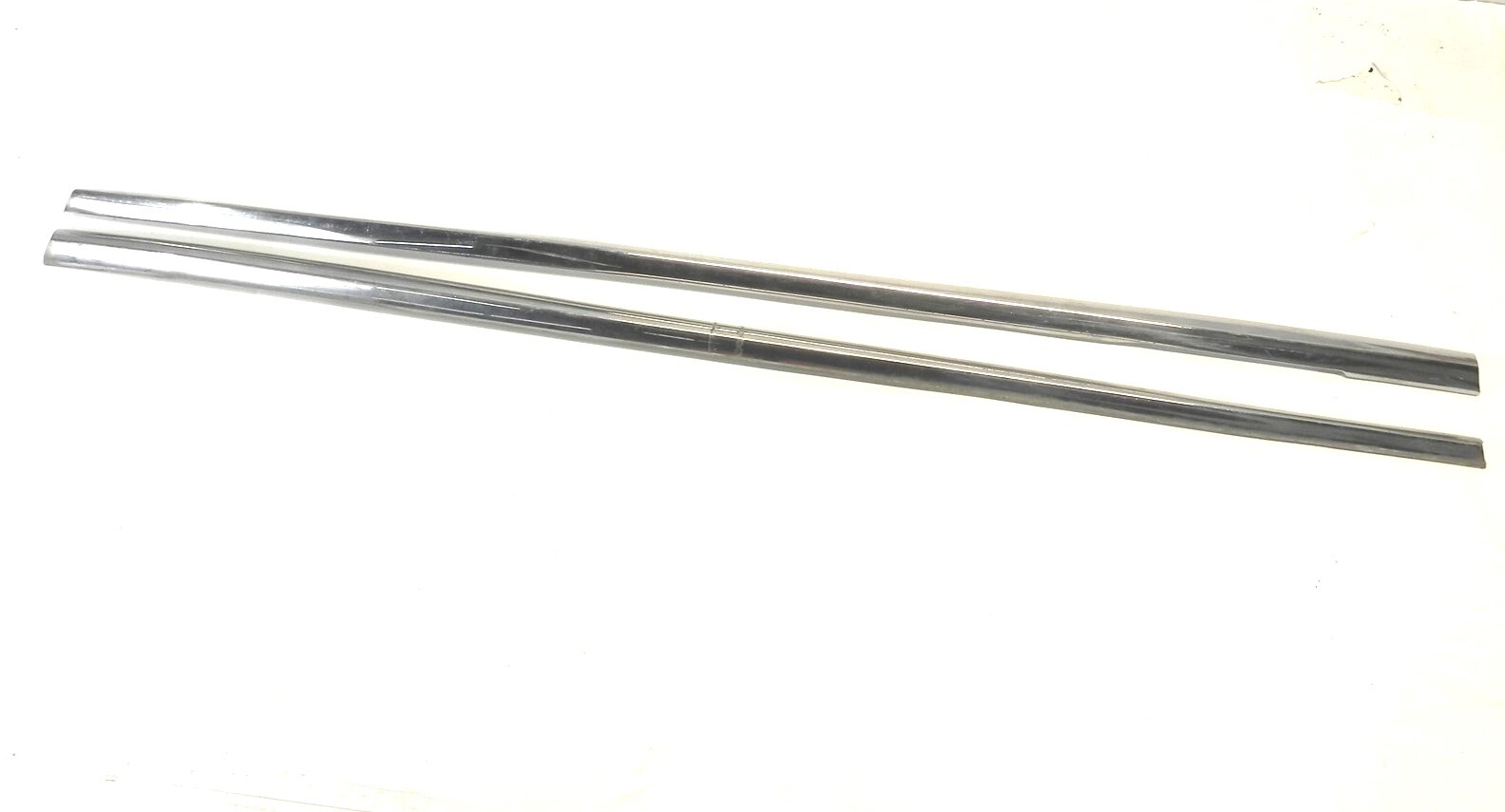 1954 CADILLAC L&R FENDER TRIM, RIGHT HAS BEND TOWARDS REAR AND FLATNESS IN FRONT