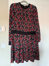 Gorgeous dress by Very size 24. Black with string red poppy design, long sleeves