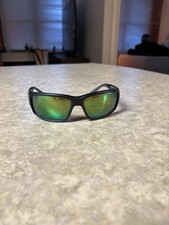Costa Del Mar fantail green poly lenses and black frames