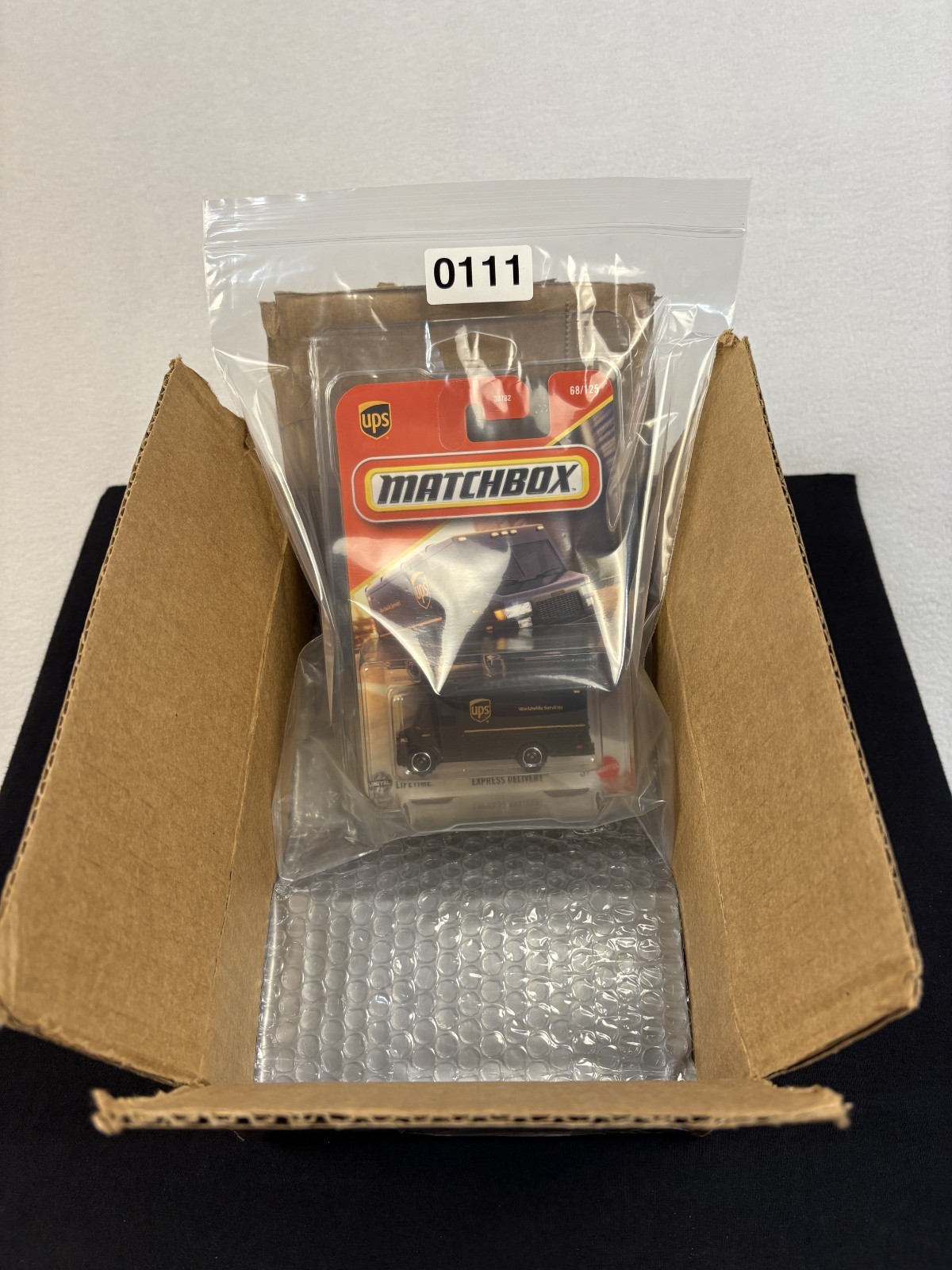 2025 MATTEL MATCHBOX UPS BROWN EXPRESS DELIVERY TRUCK VAN 68/125 W/ PROTECTOR thumbnail 13