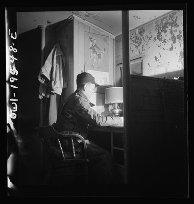 Atchison Topeka Santa Fe Railroad Caboose Conductor Studying Timetable 1943